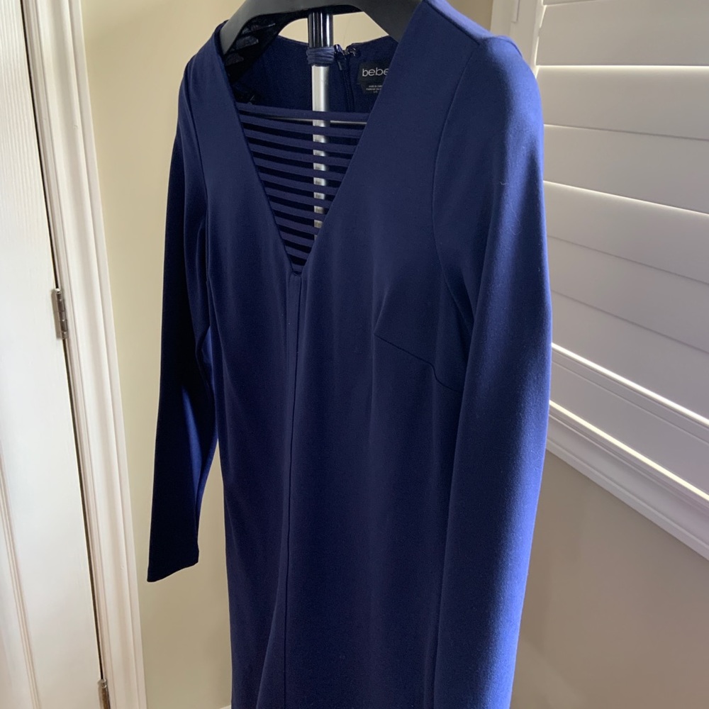 Sexy in blue. Bebe long sleeve dress only worn once. Mint